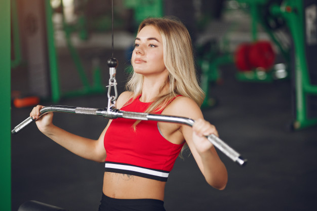 Free: Sports blond woman in a sportswear training in a gym Free Photo 