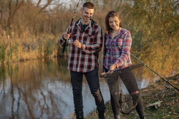 Free: Couple near river in a fishing morning Free Photo 