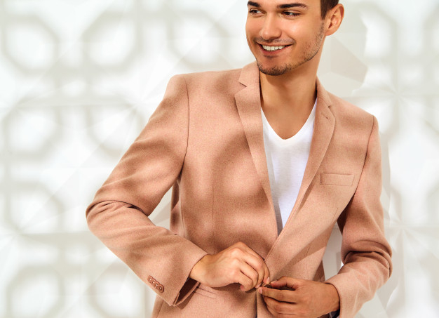 Free: Fashion stylish model dressed in elegant light pink suit