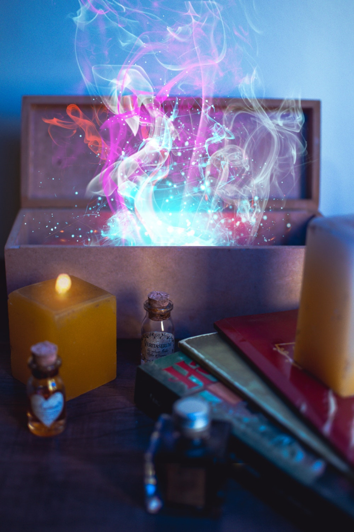 bottle,box,bright,burn,burning,candle wax,candlelight,candles,close-up,colors,dark,flame,focus,indoors,light,lighted,long exposure,luminescence,smoke,wax
