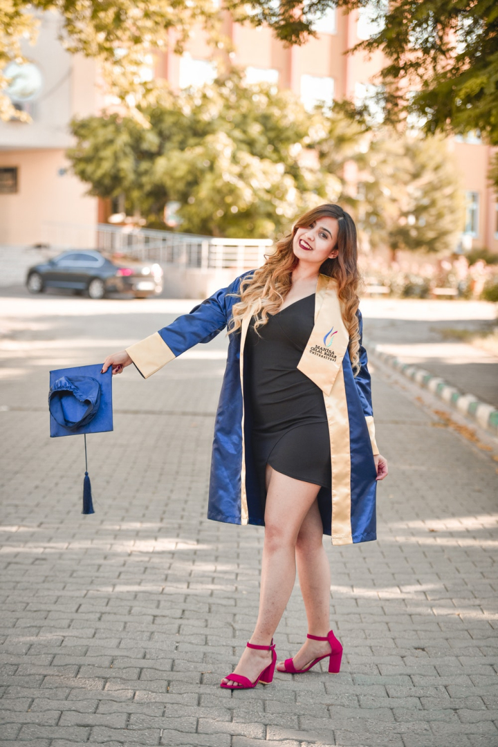 Free: Photo of Woman Wearing Academic Dress - nohat.cc