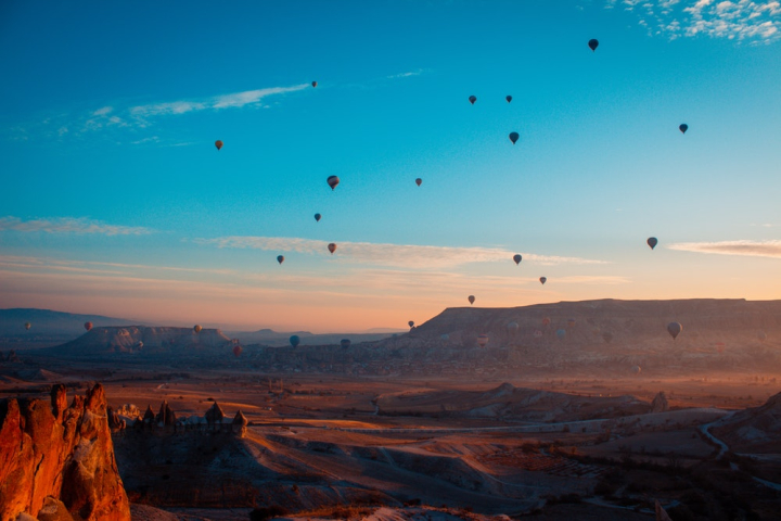 air,aircrafts,atmosphere,cappadocia,dawn,dusk,environment,flying,golden hour,hot air balloons,hot-air balloons,nevsehir,scenery,scenic,sky,turkey,valley