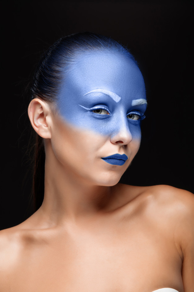 Free: Portrait of a woman covered with blue paint Free Photo 