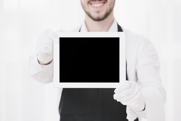 closeup,cater,showing,serving,mock,banquet,hospitality,horizontal,buffet,gloves,up,waiter,meal,apron,professional,service,smiley,company,tablet,event,work,man,party,business,mockup