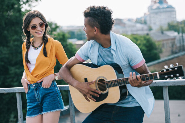 woman,jazz,urban,improvisation,musicians,young,Adults,music,multiracial,together,african american,buskers,guitarist,song,diverse,outdoors,youth,performers,rock,lifestyle,concert,street,hippy,band,daylight,roll,instruments,mixed race,man,happy,guitar,friends,sunglasses,playing,background,artists,caucasian,entertainment,hipster,people,couple,musical,depositphotos