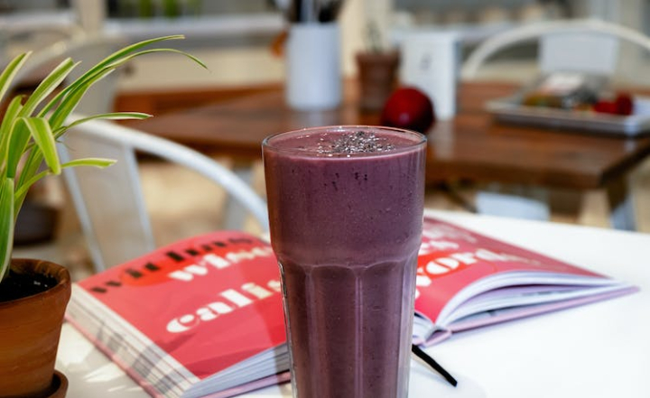book,breakfast,business,chocolate,cold drink,creamy,delicious,drink,focus,food,fruit juice,healthy diet,indoors,juice,milkshake,protein shake,relaxation,restaurant,smoothie,still life,sweet,wooden tables