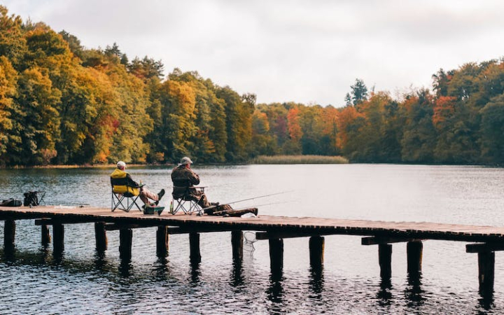 adults,autumn,autumn colors,bridge,dock,environment,fishermen,fishing,forest,guys,jetty,lake,leisure,men,nature,outdoors,people,pier,recreation,relaxation,ripples,scenic,trees,water,woods