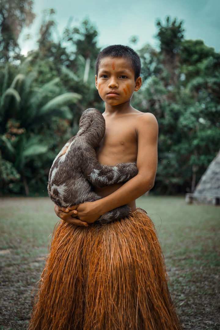 adult,amazon rainforest,child,cute,daylight,ethnic,facial expression,forest,fun,girl,hair,hairdo,jungle,jungle kid,kid,outdoors,people,peru,peruvian,portrait,sloth,smile,son,south america,travel,tribe,wear,wild animal,wildlife,woman,wood