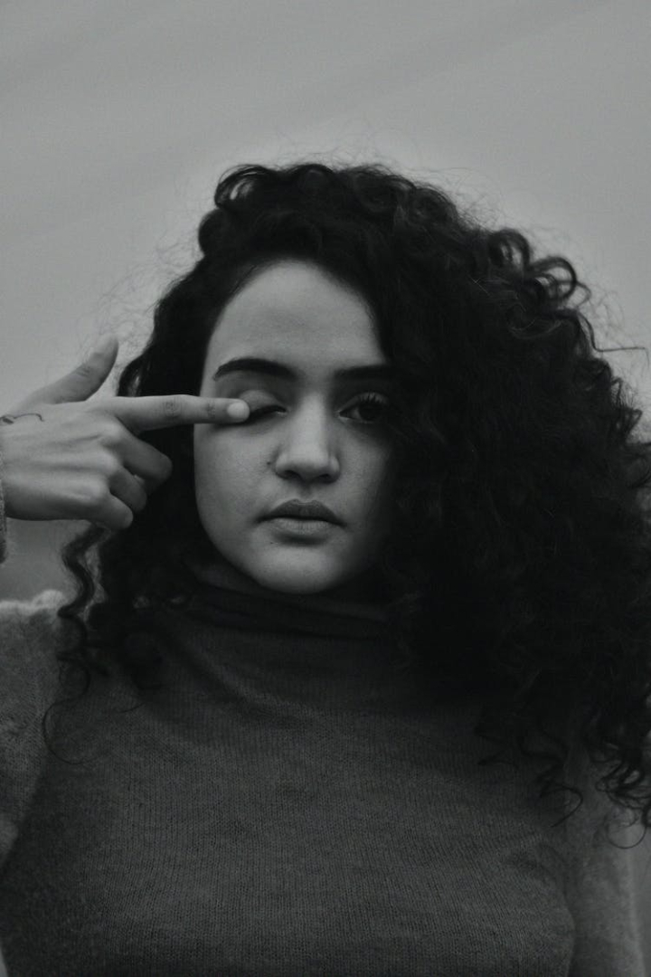 adult,attractive,beautiful,beauty,black and white,black and white portrait,casual,curly hair,face,fashion,female,hairstyle,model,monochrome,monochrome photography,person,photoshoot,poking,portrait,pose,posing,serious,wear,winking,woman