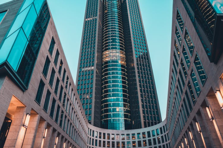 architecture,building,building exterior,business,city,commerce,contemporary,facade,finance,front,geometric,high,modern,office,outdoors,pattern,perspective,tallest,urban
