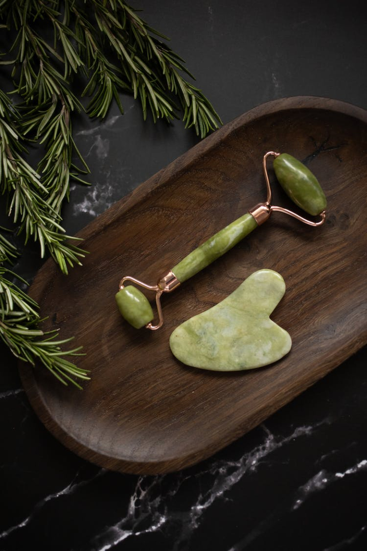 anti aging,aroma,beauty,clean,cosmetic,cosmetology,daily,dark background,facial,fresh,from above,green,gua sha,healthy,high angle,hygiene,indoors,inside,jade,lifting,marble,massage,muscle,natural,object,plate,procedure,product,quartz,rejuvenate,roller,rosemary,self care,set,skin care,spa,sprig,stone,table,therapy,tool,treat,twig,vertical shot,wellbeing,wellness,wooden