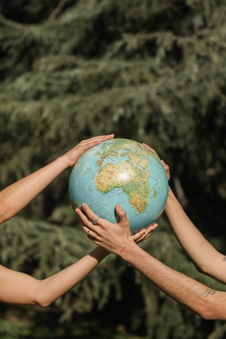 conceptual,couple,earth,earth day,eco friendly,ecology,environmental conservation,environmentalist,globe,hands,holding,mothernature,outdoors,photoshoot,planet,round,sphere,travel,vertical shot
