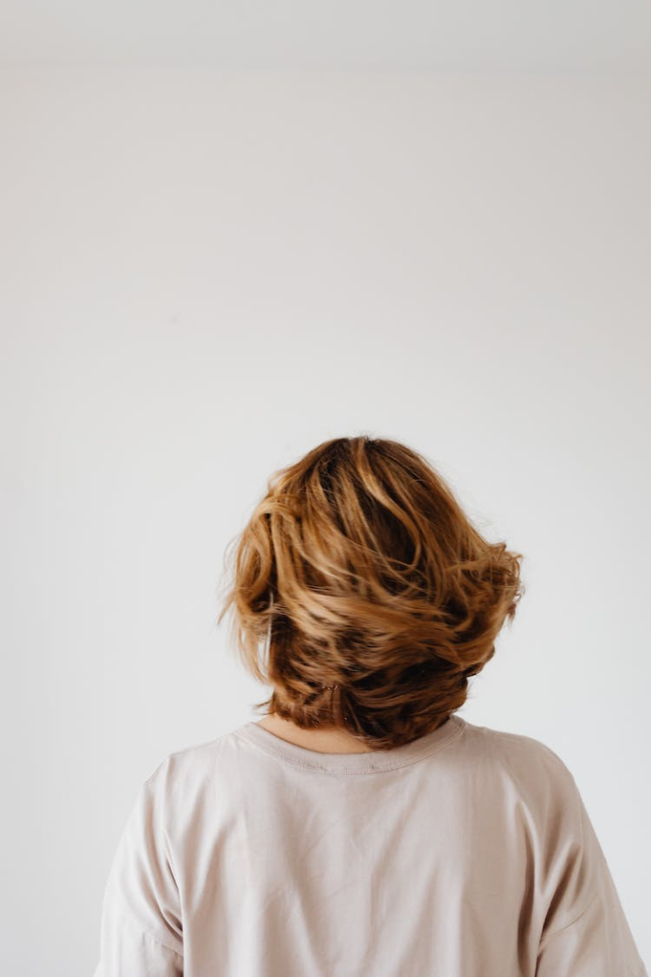 back view,copy space,hair,head,vertical shot,white,woman