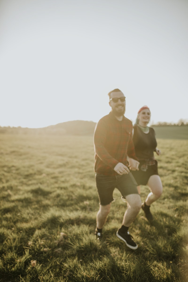 couple,couple holding hands,boyfriend,love,love hands,sneakers,glasses,boots grass,couple image,couple dating,grass,together,rawpixel