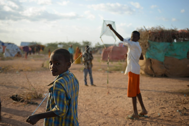 africa,refugee,kite,somalia,camp,country boy,kite flying,refugee camp,cc0 africa,country,displaced,boy playing,rawpixel