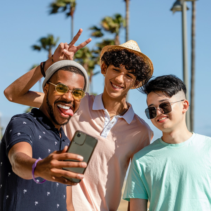 technology,people,phone,summer,beach,nature,african american,smile,palm tree,cellphone,man,smartphone,rawpixel