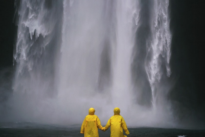 love,raincoat,couple,marriage,together,waterfall,waterfall holding hands,fingers,public domain hand,yellow woman,union,partner,rawpixel