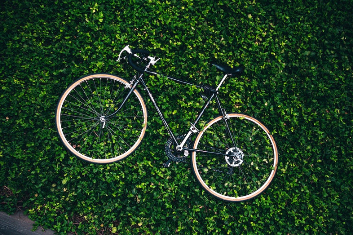 bicycle,cyclist,fitness,cycling,bike,cycle,product,relax,healthy lifestyle,bushes,background product,green land,rawpixel
