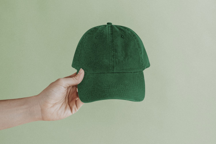 hand,minimal,green,person,fashion,photo,text space,hat,cap,clothing,product,blank space,rawpixel