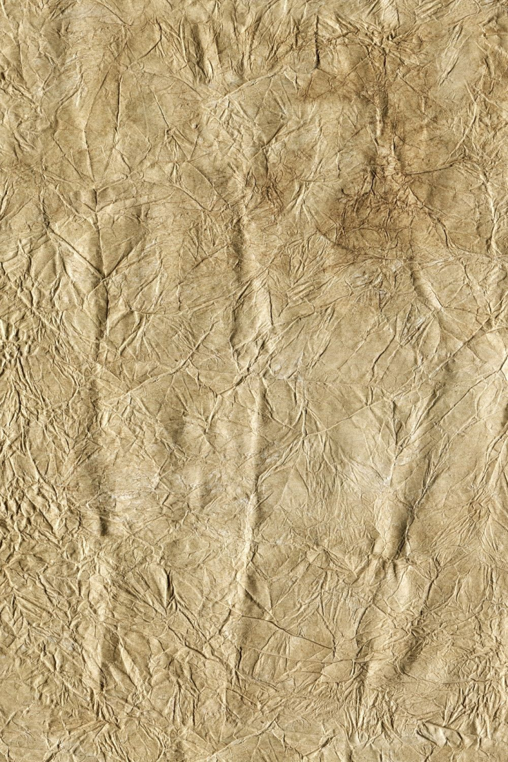 Texture Of Crumpled Yellow Paper For Design Background. Stock