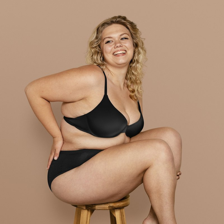 Plus Size Woman. Portrait Of Beautiful Curvy Body Positive Lady In Underwear  Stock Photo by Prostock-studio