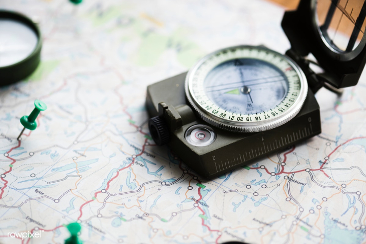 map,compass,travel,navigation,adventure,closeup,discovery,expedition,explore,free,guide,itinerary,journey,nobody,object,outdoors,pioneer,plan,trip,voyage