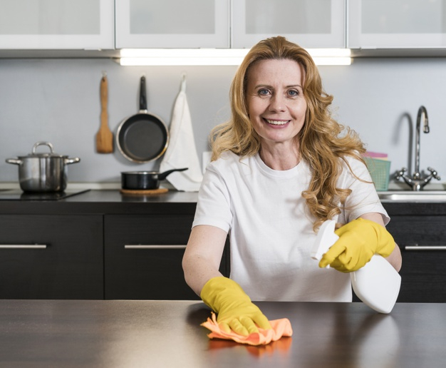 medium shot,errand,front view,domicile,rubber gloves,chore,medium,cleansing,duty,rag,residence,front,smiling,rubber,horizontal,household,shot,task,gloves,view,female,cleaning,smile,home,woman,house