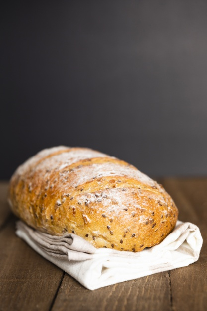 freshly,nourishment,closeup,aliment,loaf,nutritional,baked,dough,yummy,seeds,bake,close,flour,up,meal,pastry,fresh,nutrition,cloth,diet,wheat,bread,food