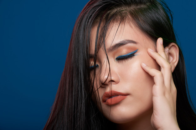 closeup,seductive,liner,posing,closed eyes,brunette,sensual,vietnamese,full,perfect,gorgeous,fingers,closed,asian,young,female,hot,temple,sexy,studio,finger,head,healthy,lips,eyes,makeup,face,beauty,hair,fashion,woman,hand