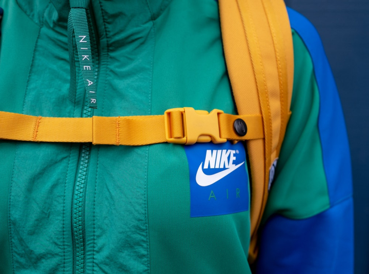 backpack,blue,brand,bright colours,casual,close-up,colors,elegant,fashion,fashion model,green,indoors,jacket,leisure,lifestyle,model,nike,outerwear,outfit,person,satin,shopping,silk,sport,strap,trademark,traditional,urban style,wear,yellow