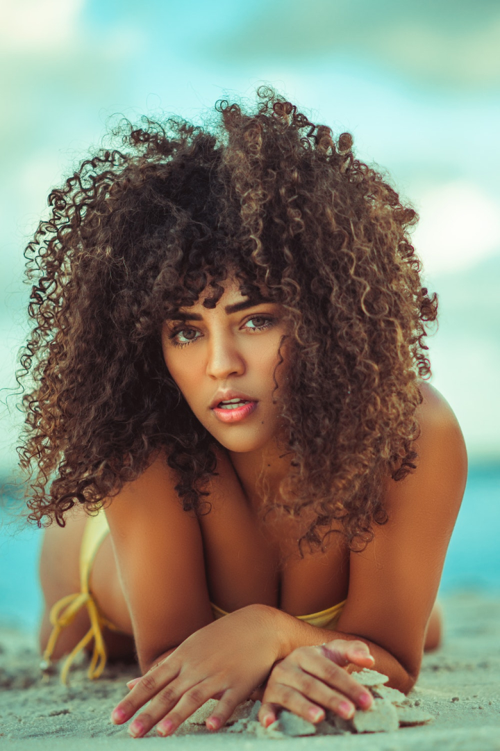 alluring,beautiful,bikini,blur,brazilian woman,curly hair,depth of field,face,facial expression,female,hairstyle,looking,lying,model,modeling,photo session,photo shoot,posing,pretty,sand,seductive,sexy,shallow focus,skin,swimsuit,swimwear,woman