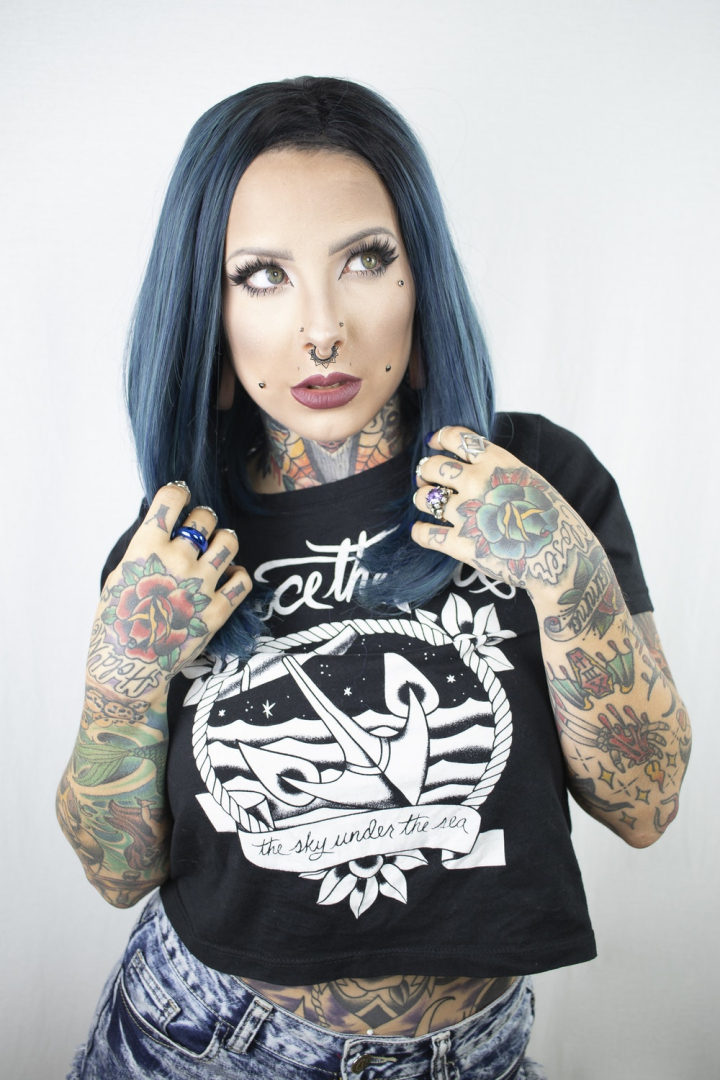 beautiful,black shirt,blue,blue hair,body art,face,fashion,female,hairstyle,looking away,model,nose piercing,nose ring,outfit,photo session,photoshoot,posing,pretty,standing,style,tattooed,tattoos,wear,white background,woman,young