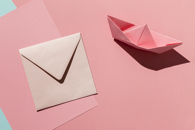 Free: Top view paper boat and envelope Free Photo 