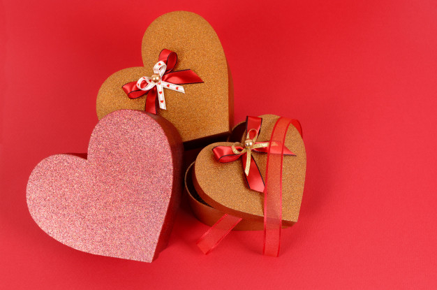 gifts,bow,valentine,gift box,red background,red,box,gift,heart,ribbon,background