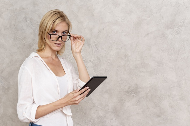 blonde,horizontal,adult,wireless,eyeglasses,device,touch,beautiful,young,female,media,tablet,person,social,glasses,internet,girl,woman,technology
