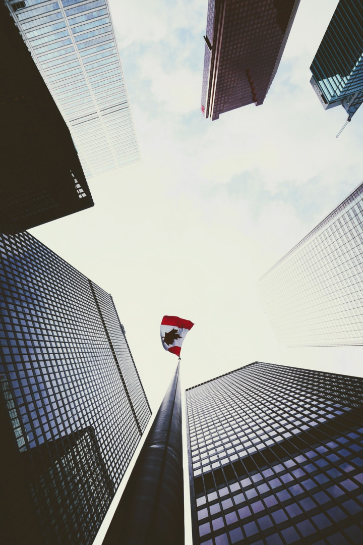 architecture,buildings,business,canada,canadian flag,commerce,finance,flag,high-rises,low angle photography,low angle shot,modern,office,ontario,perspective,skyscrapers,tallest,toronto,tower,urban,worm&#39;s-eye view