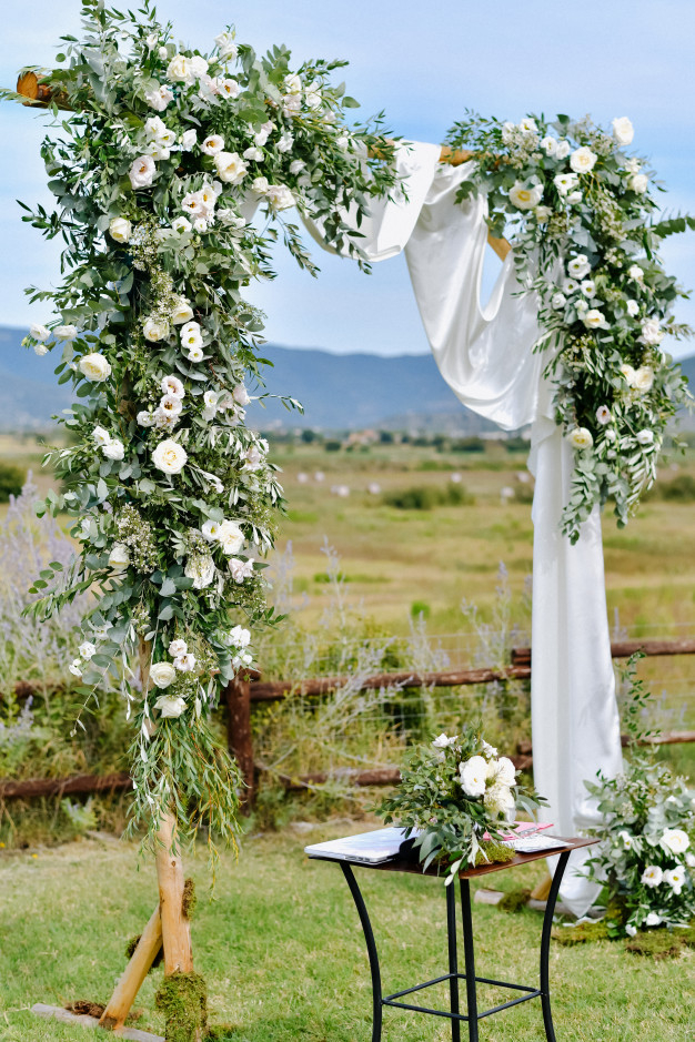 Free: Decorated wedding arch with greenery and white eustomas in the ...