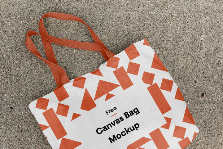 sleeve,orange,font,luggage and bags,material property,paper bag,bag,pattern,shoulder bag,triangle,mrmockup