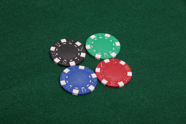 poker,chips,stack,red,blue,green,black,gamble,bet,wager,sport,addiction,risk,netstockvault