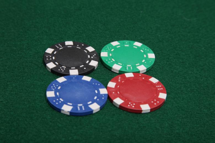 poker,chips,stack,red,blue,green,black,gamble,bet,wager,sport,addiction,risk,netstockvault