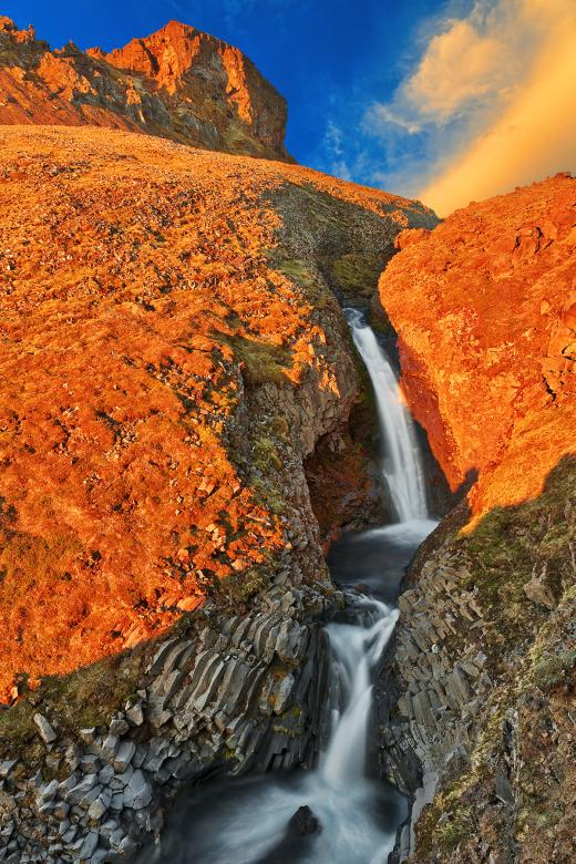 klukkufoss,waterfall,mountain,sunset,iceland,water,ragnarok,falls,liquid,fluid,flow,flowing,river,stream,rock,rocks,rocky,stone,stones,basalt,column,columns,rugged,mountains,hill,hills,cliff,moss,mossy,landscape,nature,scene,scenic,scenery,sky,cloud,clouds,cloudy,sundown,goldenhour,atmosphere,atmospheric,environment,environmental,background,backdrop,clock,icelandic,western,region,snaefellsjokull,national,park,wanderlust,travel,tourism,touristic,outside,outdoor,outdoors,exterior,beauty,beautiful,pretty,picturesque,epic,surreal,ethereal,fantasy,fantastic,dream,dreamy,wonderland,leading,line,lines,curve,curves,perspective,composition,long,exposure,soft,silky,smooth,blur,blurred,composite,detail,details,detailed,contrast,contrasted,contrasting,shade,shades,shadow,shadows,highlight,highlights,bright,brilliant,brilliance,glow,glowing,illuminate,illuminated,illumination,vivid,blue,cyan,green,yellow,orange,gold,golden,brown,white,color,colour,colors,colours,colorful,colourful,vibrant,vibrance,vibrancy,somadjinn,nicolasraymond,netstockvault