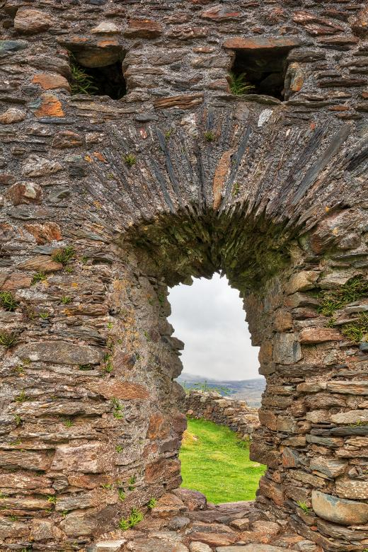 dolwyddelan,castle,wall,stone,wales,fort,fortress,fortification,stronghold,ruin,ruins,architecture,architectural,building,landmark,structure,construction,walls,arrowslit,arrow,slit,stones,rock,rocks,landscape,scene,view,plant,plants,grass,sky,cloud,clouds,cloudy,overcast,background,backdrop,welsh,cymru,uk,united,kingdom,great,britain,wanderlust,travel,tourism,touristic,outside,outdoor,outdoors,exterior,beauty,beautiful,pretty,epic,surreal,ethereal,fantasy,fantastic,concept,conceptual,personify,personified,personification,anthropomorphize,anthropomorphiza,face,head,eye,eyes,mouth,grimace,grimacing,gasp,scream,screaming,shock,shocked,surprise,surprised,scare,scared,scary,horror,emote,emoticon,funny,humor,humorous,humour,humourous,comic,comical,nostalgia,nostalgic,retro,old,oldworld,old-world,oldstyle,old-style,vintage,age,aged,aging,ancient,medieval,middle-ages,middle,ages,history,historic,historical,heritage,legacy,abandoned,dilapidated,disrepair,rundown,neglect,neglected,forlorn,texture,textured,textural,worn,weathered,raw,rough,grunge,grungy,grunginess,grime,grimy,griminess,grit,gritty,grittiness,leading,line,lines,curve,curves,winding,triangle,triangles,triangular,arch,arches,arched,archway,arc,arcs,rectangle,rectangles,rectangular,geometry,geometric,geometrical,perspective,composition,frame,framed,framing,closeup,close-up,close,up,hdr,high,dynamic,range,composite,contrast,contrasted,contrasting,shade,shades,shadow,shadows,highlight,highlights,light,lights,vivid,green,yellow,orange,brown,beige,maroon,white,grey,gray,black,color,colour,colors,colours,colorful,colourful,vibrant,vibrance,vibrancy,somadjinn,nicolasraymond,netstockvault