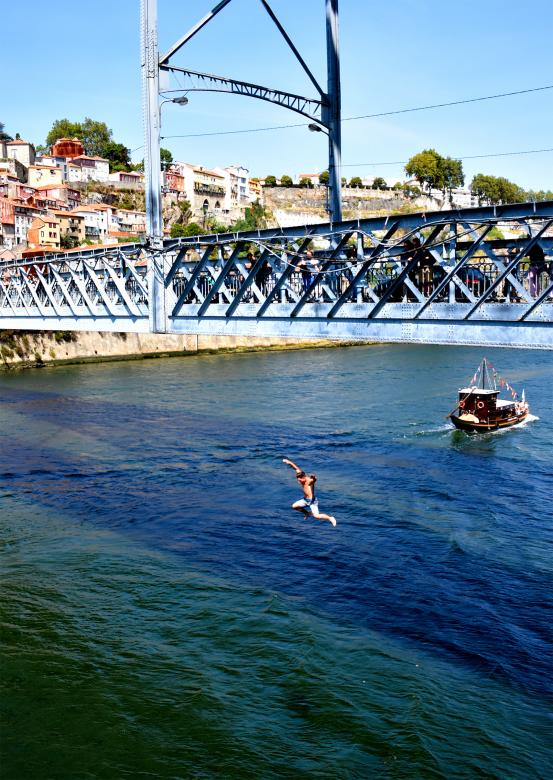 jumping,male,bridge,arch,metal,city,cityscape,europe,european,historic,historical,landmark,portuguese,river,town,architecture,oporto,day,downtown,scene,scenic,skyline,tourist,attraction,travel,destination,view,douro,famous,old,sunset,water,port,wine,porto,portugal,boats,district,ribeira,iberian,rowboats,scenery,wines,unesco,world,heritage,site,culture,ancient,building,buildings,dom,dusk,luis,evening,history,houses,illuminated,lighted,lights,mediterranean,night,panorama,reflecting,romantic,urban,storage,traditional,transporting,vintage,valley,afternoon,charming,alley,alleyway,architectural,avenue,basilica,cathedral,chapel,church,gaia,iberians,location,oldcity,place,road,street,tower,twilight,villa,seyrig,eiffel,engineering,steel,double-decker,truss,iron,netstockvault