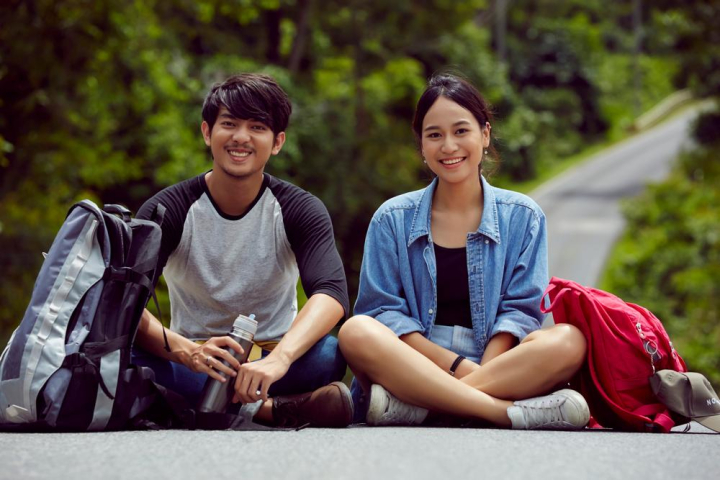 smiling,couple,asian,young,travellers,sitting,together,young travellers,travel,thai,thailand,khao yai,khao yai national,tourist,tourism,holiday,handsome,male,female,asia,vacation,journey,youth,outdoors,adult,adventure,teenager,unwild,wanderlust,looking,beautiful,guy,gray,beard,pretty,lady,happy,people,fun,group,twenties,jungle,expedition,leisure,enjoying,sit on road,portrait,outing,trip,nature,traveller,xframe