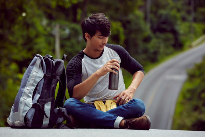 handsome,man,holding,flask,flask of water,sitting,forest,vacation,journey,youth,outdoors,adult,enjoying,sit on road,portrait,outing,trip,nature,unwild,wanderlust,alone,looking,smiling,adventure,teenager,twenties,jungle,expedition,leisure,backpack,beautiful,guy,gray,beard,happy,young travellers,travel,thai,thailand,khao yai,khao yai national,tourist,tourism,holiday,traveller,xframe