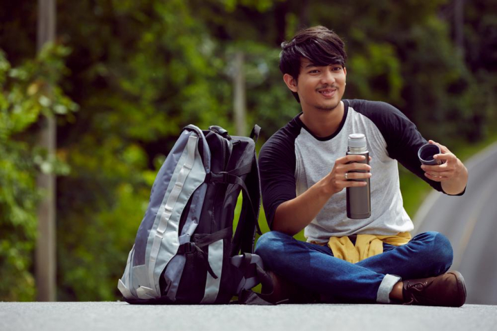 handsome,man,smile,holding,flask,flask of water,relaxing,teenager,twenties,jungle,expedition,leisure,backpack,enjoying,sit on road,portrait,outing,trip,nature,unwild,wanderlust,alone,looking,smiling,beautiful,guy,gray,beard,happy,young travellers,travel,thai,thailand,khao yai,khao yai national,tourist,tourism,holiday,vacation,journey,youth,outdoors,adult,adventure,road,traveller,xframe