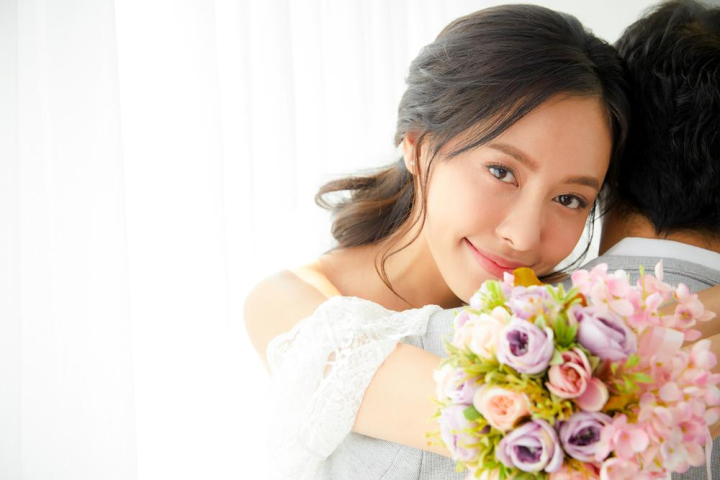 beautiful woman,female,females,lady,woman,women,bride,ring,rings,happy,marriage,married,marry,marrying,wedding,dress,dresses,white,person,material,materials,she,youthful,beautiful,clean,pretty,asian,east asians,cheerful,vibrant,june bride,grin,grinning,smile,smiling,nuptials,weddings,wedding dress,portrait,portraits,indoor,bridal,beauty,impression,thrilled,impressed,feeling of being moved emotionally,adoration,longing,groom,20,bridegroom,engagement ring,joy,joyful,rejoicing,well being,wellbeing,betrothal,engagement,flower,flowers,bouquet,bouquets,love,amour,goal,goals,anniversary,rose,roses,xframe