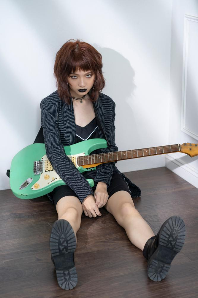 beautiful young girl posing with guitar Stock Photo | Adobe Stock