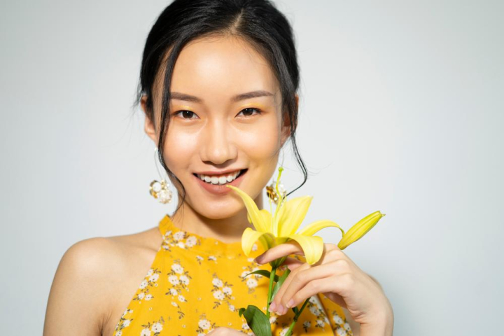 adult,aroma,attractive,background,beautiful,beauty,body,care,asian,clean,cosmetics,cute,face,fashion,female,floral,flower,fresh,girl,hair,happy,blossom,healthy,lady,lily,makeup,model,natural,nature,people,person,yellow,portrait,posing,pretty,earrings,toothy,dress,skin,smile,spa,spring,studio,treatment,wellness,eyes,woman,young,looking,20s,xframe
